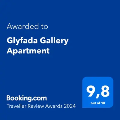 a blue screen with the text awarded to gilaila gallery appointment at Glyfada Gallery Apartment by First Class Properties in Athens