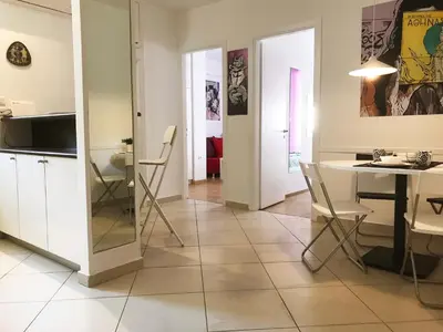 a kitchen and dining room with a table and chairs at Athens by foot: Perfect flat with terrace in Athens