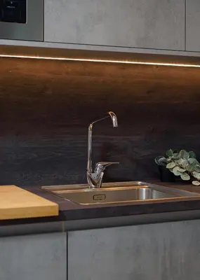 a kitchen sink with a faucet on a counter at Athenian Stylish Living in Athens