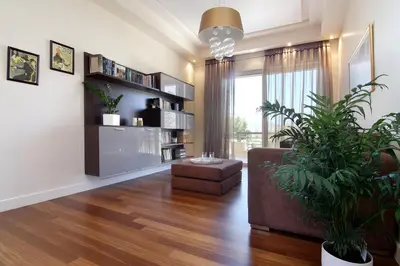 a living room with a couch and a plant at Villa Sabia in Vari