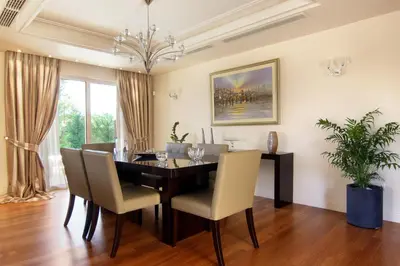 a dining room with a table and chairs at Villa Sabia in Vari