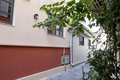 an entrance to a building with a white door at THISIO LOFT in Athens