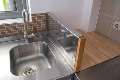 a stainless steel sink in a kitchen at THISIO LOFT in Athens