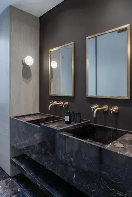 a bathroom with two sinks and two mirrors at Kinglin Luxury Living in Athens