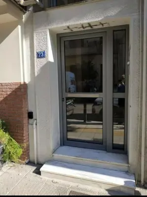 a front door of a house with at Athens Central Pangrati - Varnava Square Modern Apartment for 5 in Athens