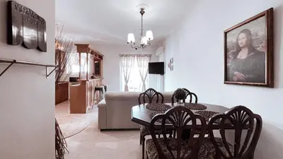 a kitchen and dining room with a table and chairs at IVY Muse 1BR Apartment in Neos Kosmos Athens in Athens