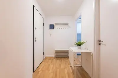 a hallway with a mirror and a table at Apartment at Megaro Mousikis st semi basement 1bed 2 pers by MPS in Athens
