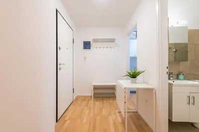 a bathroom with white walls and a mirror at Apartment at Megaro Mousikis st semi basement 1bed 2 pers by MPS in Athens