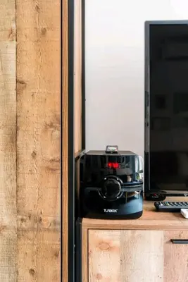a camera sitting on a desk next to a computer monitor at Explore a New Arts District from a Hip Studio Flat in Athens