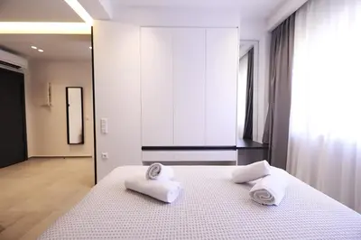a bedroom with two towels on a bed at K58 Luxury Apartment Monastiraki Metro Station Acropolis Jacuzzi by GK Properties in Athens