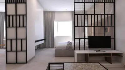 a living room with a television and a bed at K58 Luxury Apartment Monastiraki Metro Station Acropolis Jacuzzi by GK Properties in Athens