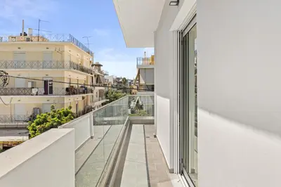 a view from the balcony of a building at BillyMare central Glyfada apartment in Athens
