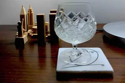 a wine glass sitting on top of a table at Athens Riviera Garden Views Apartment #Unoblu in Athens