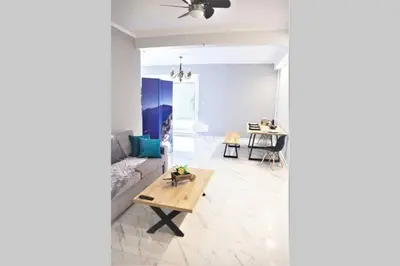 a living room with a couch and a table at Athens Central 3BD Apartment next to Metro Luxury in Athens