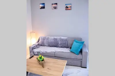 a living room with a couch and a table at Athens Central 3BD Apartment next to Metro Luxury in Athens