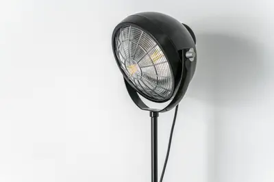 a black light on a stand on a white background at Majestic Flat with Huge Terrace in the City Center in Athens