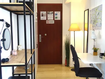 an office with a desk and a chair and a door at Hermes New & Comfy Studio - 25' walk to the Acropolis in Athens