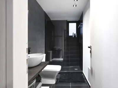 a black and white bathroom with a sink and a toilet at 200 Mb fibre remote workers' Dreamhouse in Athens