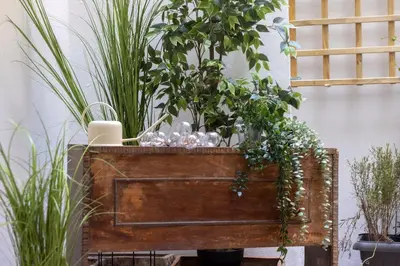 a wooden box with plants on top of it at Marina Zeas apartment by the sea in Piraeus