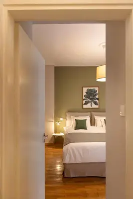 a bedroom with a bed in a room at Marina Zeas apartment by the sea in Piraeus