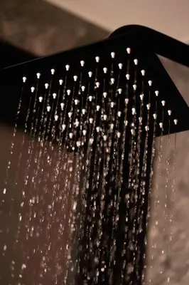 a shower head filled with lots of water at Mamy Blue Slow Living in Athens