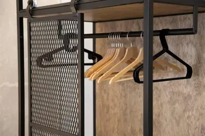 a rack with wooden utensils on it at Plaka Filotheis House B in Athens