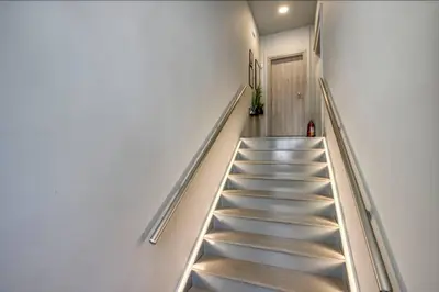 a staircase in a building with a stair case at Plaka Filotheis House A in Athens