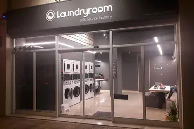a store front of a store with washing machines at Georgia's Cozy Apartment in Koukaki in Athens