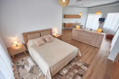 a bedroom with a bed with two pillows on it at The EL GRECO spirit meets the Athenian luxury Apt1 in Athens