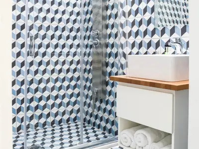 a bathroom with a shower and a sink at Iasonos Suites Athens in Athens