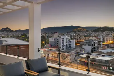 a balcony with a view of a city at ATHENIAN VIEW LOFT in Athens