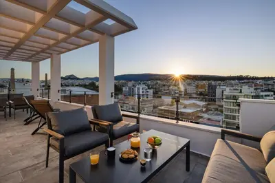 a balcony with a view of a city at ATHENIAN VIEW LOFT in Athens