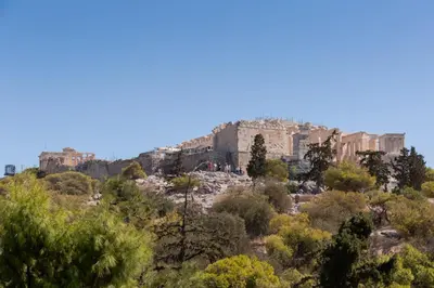 a view of the acropolis of athens from the trees at Katsanis luxury apt., stunning view of acropolis in Athens