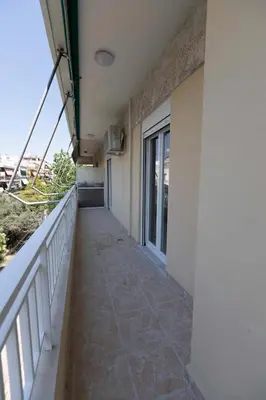 a corridor of a building with a balcony at The brand new House meets the ideal location Apt1 in Athens