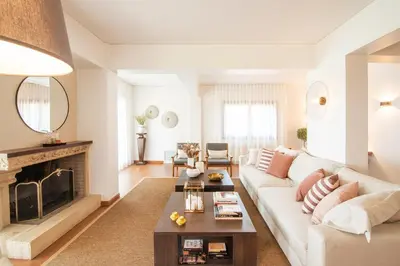 a living room with a couch and a fireplace at Villa Terra Mare in Vari