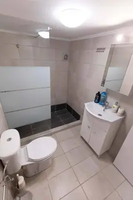 a bathroom with a toilet and a sink at The brand new House meets the ideal location Apt2 in Athens