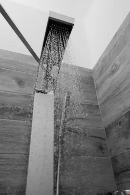 a shower in a building with water coming out of it at Villa Beis in Porto Rafti