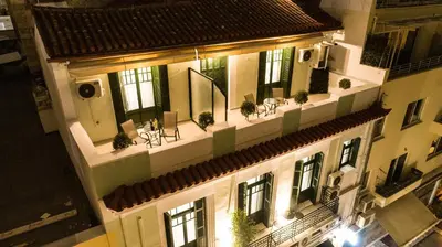 an overhead view of a building with a balcony at Pandrosos Divine Suites in Athens