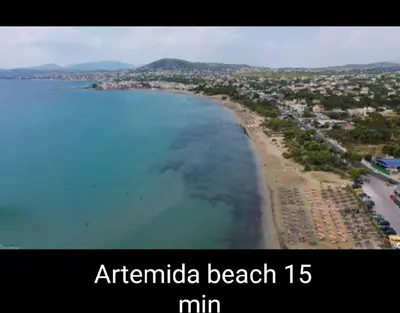 an aerial view of a beach and the ocean at Casa Martina 2 (Spata) 10min El.Venizelos airport. in Spáta