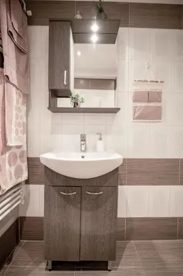 a bathroom with a sink and a mirror at The Ivory - Luxury & Spacious Apartment in Egaleo-Athens in Athens