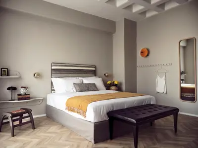 a bedroom with a large bed with a bench next to it at Pallineon House in Athens