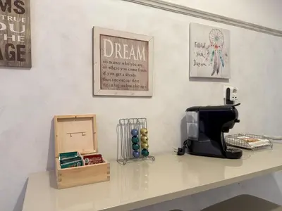a counter with a coffee maker and a dream on it at 2 Bedrooms Apartment Center of Athens 4 min Subway in Athens