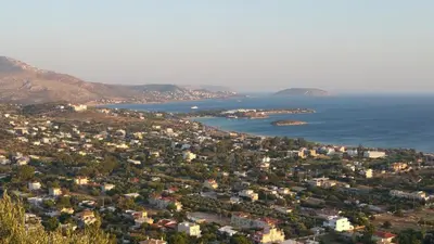 an aerial view of a city and the ocean at Ferienhaus Athens Marmor Garden in Kalívia Thorikoú