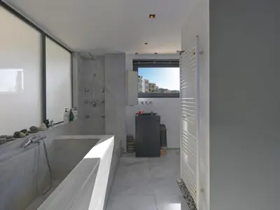 a bathroom with a tub and a sink at Eastern Aromas loft in Psyri, Athens in Athens