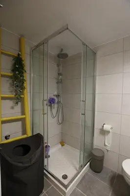 a shower with a glass enclosure in a bathroom at Boutique17 Luxury Apartment 2nd floor in Athens