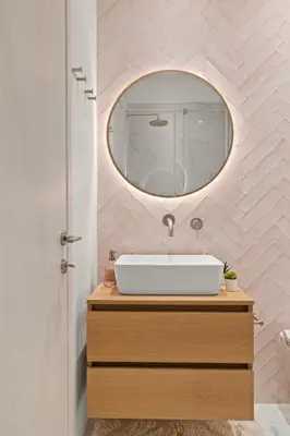a bathroom with a white sink and a mirror at Little Athens in Athens