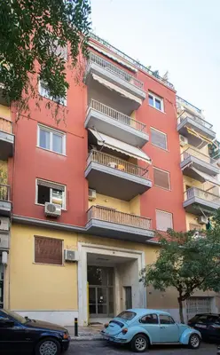 a blue car parked in front of a building at Upscale Luxury Athens Renovated Dream Home in One of the most Favorable Locations by National Gardens, Zoo & Hellenic Parliament in Syntagma and Stylish Exquisite Kolonaki neighborhood in Athens