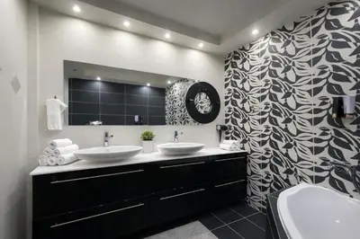 a bathroom with two sinks and a large mirror at 5-Star feel - Luxury penthouse for 4 with huge balcony & view ,8 min from Athens airport in Koropíon