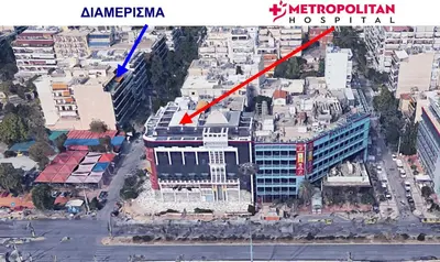 a map of a city with a red arrow pointing to a building at METROPOLITAN MACVIEW-4 ΔΙΑΜΕΡΙΣΜΑ in Piraeus