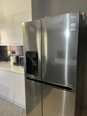 a stainless steel refrigerator in a kitchen at Chalandri Sweet House in Athens